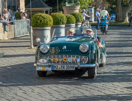 Wiesbaden, Germany - September 24, 2021: the Triumph TR3A reaches the final goal of the Oldtimer...