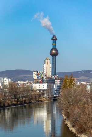 Vienna, Austria - February 15, 2019: Spittelau waste incineration plant of the city Vienna (in German Fernwarme Wien) designed by Hundertwasser.のeditorial素材