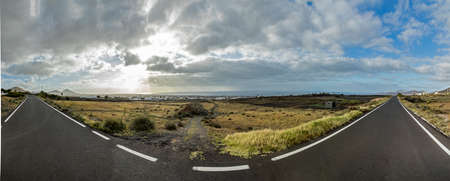 scenic view to Landscape with empty road in Lanzarote, Canary Islands, Spain
