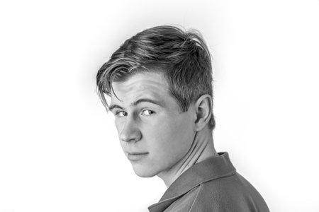 portrait of cool boy in green shirt with red hairの写真素材