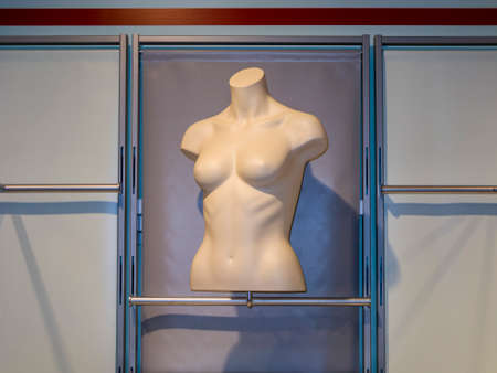 many naked female dummies in a window shopの写真素材