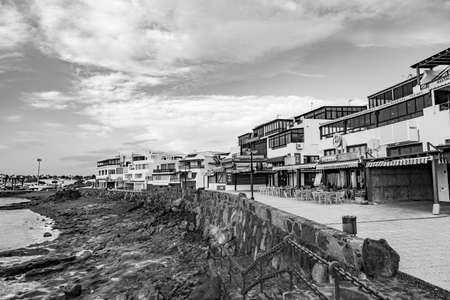 Playa Blanca, Spain - December 22, 2010: view to promenade of Playa Blanca in early morning without...