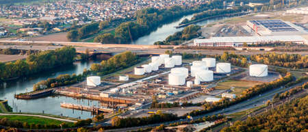 Raunheim, Germany - September 29, 2014: approaching Frankfurt airport with view to the oil station with big tanks in Raunheim, Germany.のeditorial素材