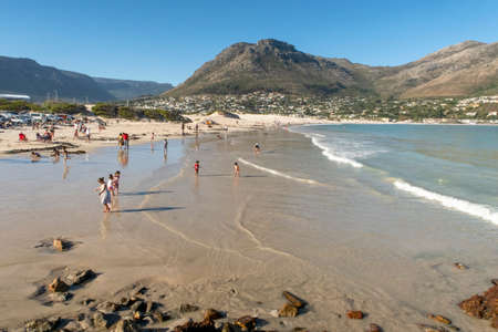 Cape Town, South Africa - April 15, 2018: People enjoy the beach at Cape Town, South Africa.のeditorial素材