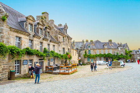 Locronan, France - September 17, 2019: Medieval streets of Locronan, a small town in Brittany, France. It is one of the most beautiful villages in France.のeditorial素材