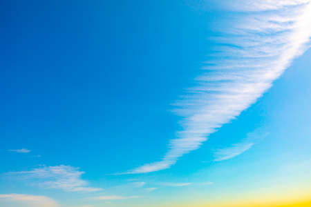 background of blue sky with small soft clouds as harmonic background