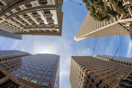 fisheye perspective of skyscraper downtown in financial district of San Francisco, USAの写真素材