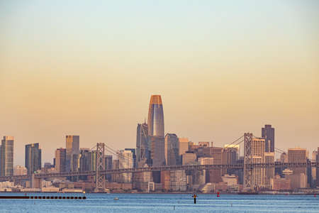 scenic sunrise in San Francisco seen from Oakland harbor areaの写真素材