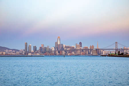 scenic sunrise in San Francisco seen from Oakland harbor areaの写真素材