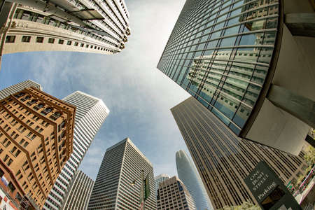 San Francisco, USA - Jun 19, 2022: fisheye perspective of skyscraper downtown in financial district...