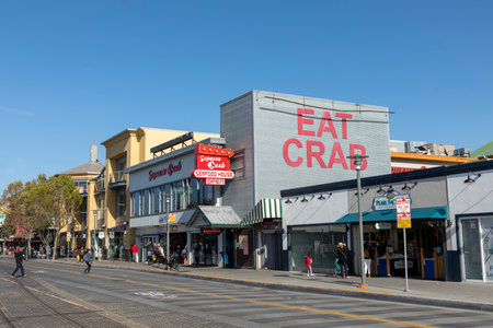 San Francisco, USA - May 18, 2022: historic buildings at the promenade of Sisherman's wharf in San Francisco in early morning.のeditorial素材