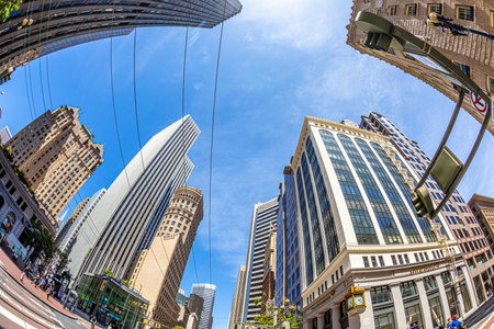 San Francisco, USA - May 19, 2022: modern skyscraper standing near historic buildings land skyscraper in San Francisco seen from Market street.のeditorial素材