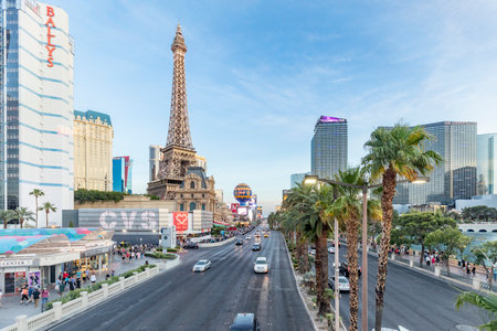Las Vegas, USA - May 23, 2022: panoramic view of the Ballys Hotel and other famous hotels and casino with palm trees and Eiffel tower at the strip.のeditorial素材