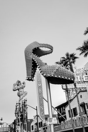 Las Vegas, USA - March 9, 2019: Close up of the famous Ruby Slipper neon sign, downtown Las Vegas, near the Fremont Street Experience. Las Vegas is known for its historical neon signs.のeditorial素材