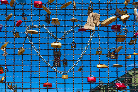 Cologne, Germany - May 29, 2011: lockers at the Hohenzollern bridge symbolize love for ever in Cologne, Germany. It is the most heavily used railway bridge in Germany and used by pedestrians in love.のeditorial素材