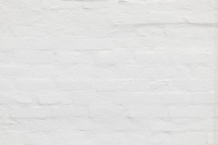 old white brick wall with soft plaster coating in Syltの写真素材