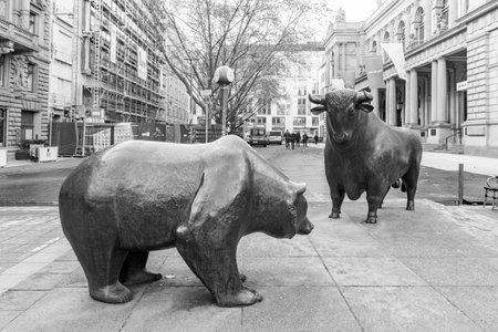 Frankfurt, Germany - December 13, 2022: Bull and Bear Statues at the Frankfurt Stock Exchange in Frankfurt, Germany. Frankfurt Exchange is the 12th largest exchange by market capitalization.のeditorial素材