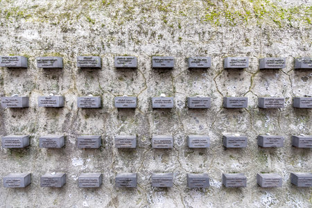 Frankfurt, Germany - January 25, 2023: names of killed jewish people at a wall of the old jewish cemetery in Frankfurt, Germany.のeditorial素材