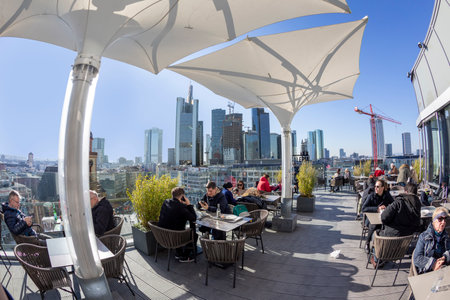Frankfurt, Germany - February 8, 2023: scenic view to skyline of Frankfurt from platform at Kaufhof building with restaurant.のeditorial素材