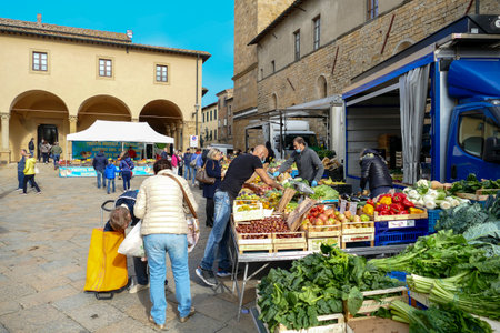 Siena, Italy - October 23, 2021: farmers market in Sienna with fresh vegetables and local food.のeditorial素材