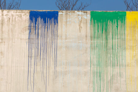 pattern of flowing color at a concrete wall