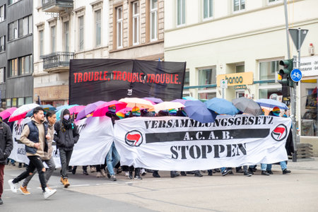 Wiesbaden, Germany - March 11, 2023: people demonstrate for change of the Assembly Act - eng. assembly law - in Wiesbaden, Germany. Politics will sharpen the law and protestants are against the sharpening.のeditorial素材