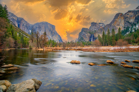 Beautiful view in Yosemite valley with half dome and el capitan in winter from merced riverの写真素材