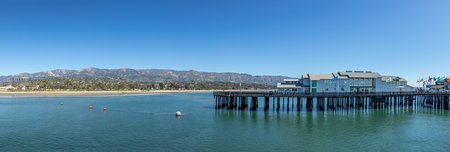 Santa Barbara, USA - March 16, 2019: scenic pier in Santa Barbara - Stearns wharf - with empty beach in midday heat.のeditorial素材