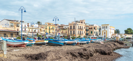 Modello, Italy - February 11, 2023: fishermens boats at the beach in the center of Mondello.のeditorial素材