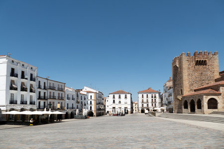 Caceres, Spain - August 8, 2022: main square of Caceres in Spain with historic tower.