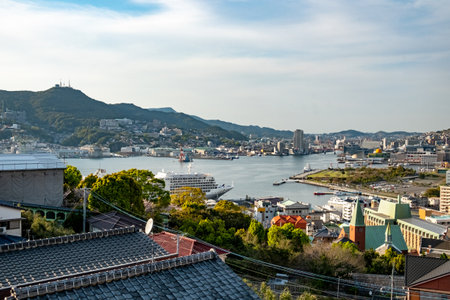 Nagasaki, Japan - April 1, 2023: view to skyline of Nagasaki with harbor seen from Glover gardenのeditorial素材