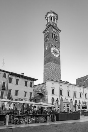 Verona, Italy - August 4, 2009: people visit the old medieval town of Verona in late afternoon in summer time.のeditorial素材