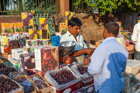 New Delhi, India - November 17, 2011: people at Meena Bazaar in Chandni Chowk area selling goods at the old open air market in India.のeditorial素材