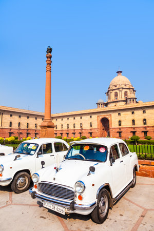 Delhi, India - November 17, 2011: AMBASSADOR car in front of indian parliament. the replica of Morris Oxforf model is still produced by HINDUSTAN MOTORS and standard for politicians.のeditorial素材