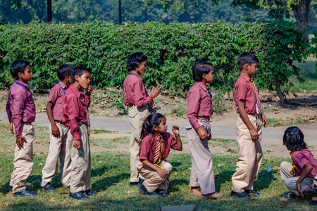 New Delhi, India - November 17, 2011: children at india gate in school uniform have an excursion organized by the school to visit india gate.のeditorial素材