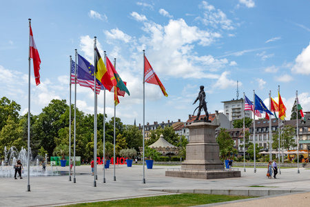 Colmar, France - June 21, 2023: statue of General Rapp at Rapp square with flags of the contries of the european union in Colmar, Franceのeditorial素材