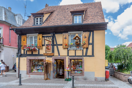 Ribeauville, France - June 23, 2023: A picturesque colorful street of half-timber buildings with shops and cafes in the village of Ribeauville, in the Alsace region.のeditorial素材