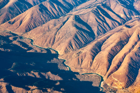 Mountains in the Sary Kamysh mountain range in central Kyrgyzstan, Kyrgyzstanの写真素材