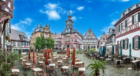 Heppenheim, Germany - August 2, 2023: view to historic market square in Heppenheim in rainy weather.