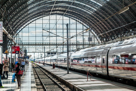 Frankfurt, Germany - May 16, 2014: Inside the Frankfurt central station in Frankfurt, Germany. People hurry to the intercity high speed train.のeditorial素材