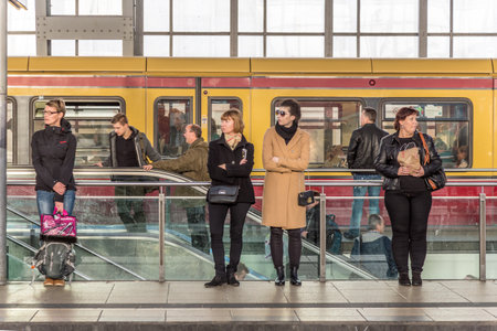 Berlin, Germany - October 27, 2014: Peope travel at Alexanderplatz subway station in Berlin,...