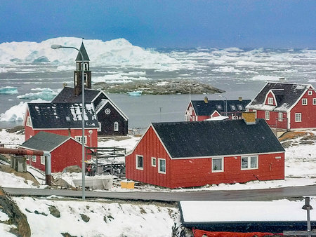 Ilulissat â€“ the village with famous Icefjord in snow, Greenland