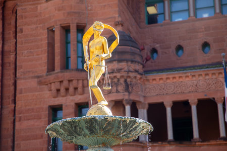 Lady Justice Statue on Water Fountain with San Antonio Downtown Building in Background, Texas, USAの写真素材