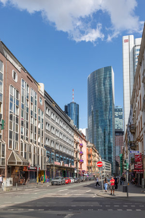 Frankfurt, Germany - August 25, 2024: View to modern skyscraper downtown Frankfurt, seen from red light district at the central train station in Frankfurt.のeditorial素材