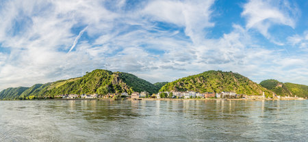 panoramic view to scenic river rhine valley with vineyards from Spay to St. Goarshausen at the other rhine valley side a Unesco world heritage siteの写真素材