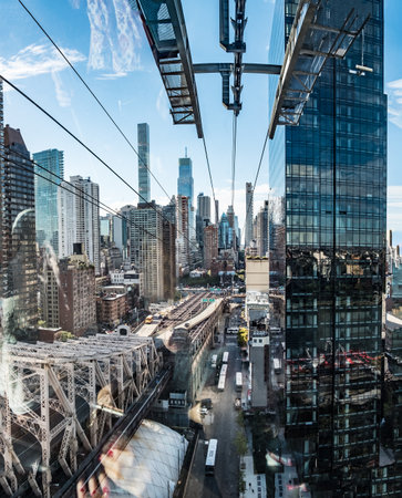 New York, USA - October 10, 2017: Skyline of New York seen from Brooklyn Bridge with river in frontの写真素材