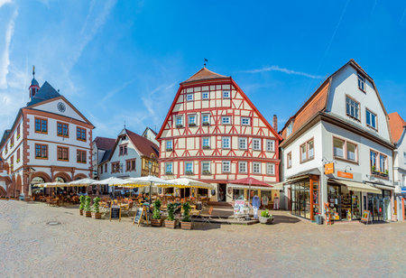 Wuerzburg, Germany - May 17, 2017: Scenic view to old market square with farmers market in Wuerzburg with historic half timbered houses.の写真素材