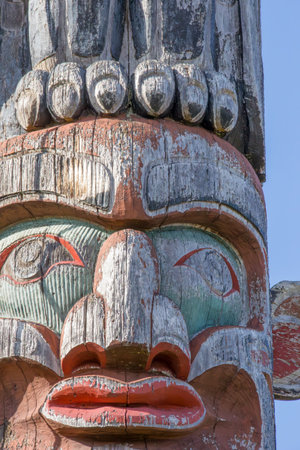 Duncan, Canada - August 22, 2016: Old traditional wooden totem masks in Canada.のeditorial素材