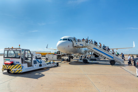 Valencia, Spain - September 17, 2024: Lufthansa jet ready for boarding with passengers embarking the aircraft at Valencia.のeditorial素材