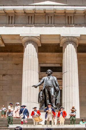 New York, USA - July 9, 2010: Ceremony for declaration of independence in old costumes takes place at the Washington statue in front of federal Hall National Memorial in New York, USA.のeditorial素材